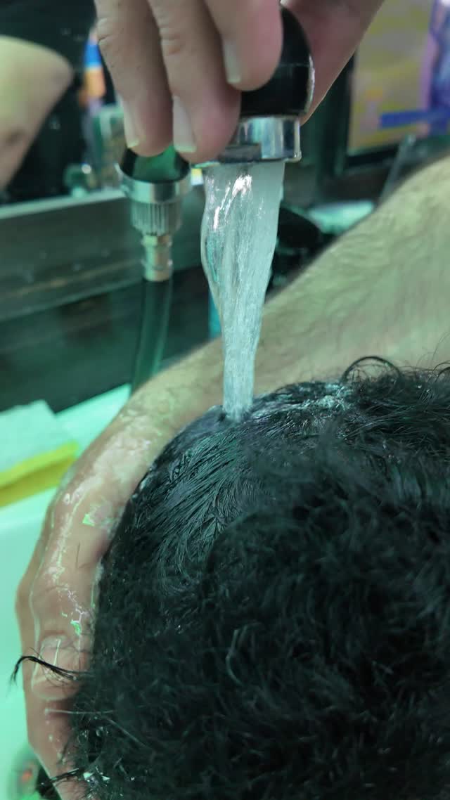 Hair wash at the basin